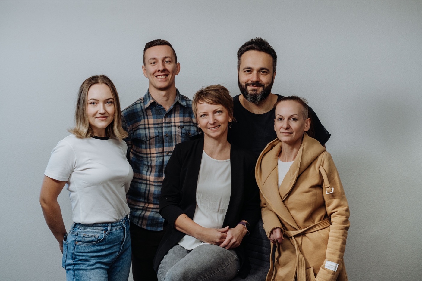 The Handymade team — five team members in the workshop