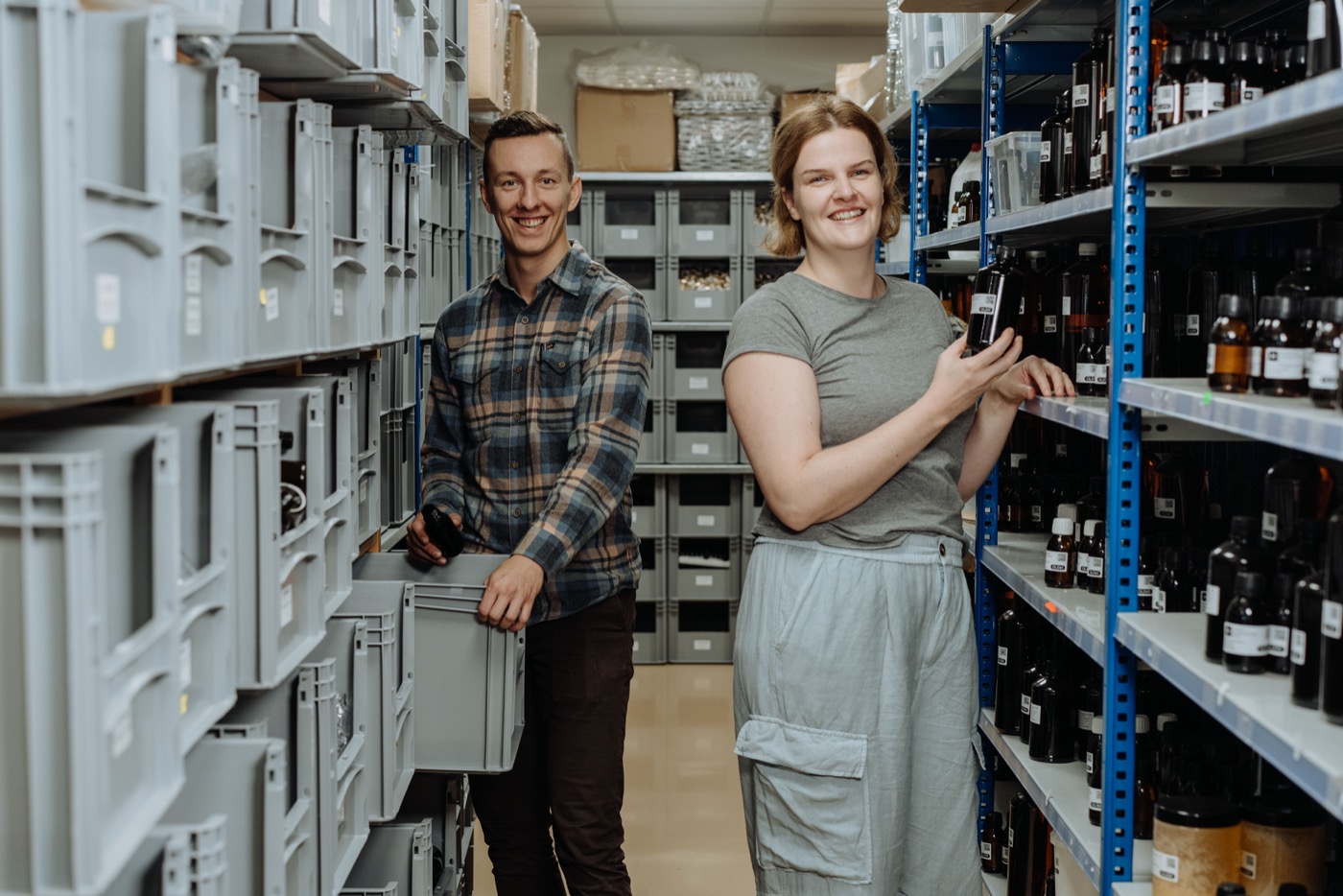 Handymade warehouse — shelves with raw materials in small bottles and crates