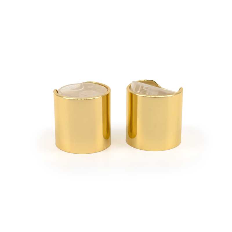 Aluminum disc top type lid that opens by pushing on one side of the top and the other side opens.
Colour: transparent top and shiny gold hoop
Size: 24/410
Ma