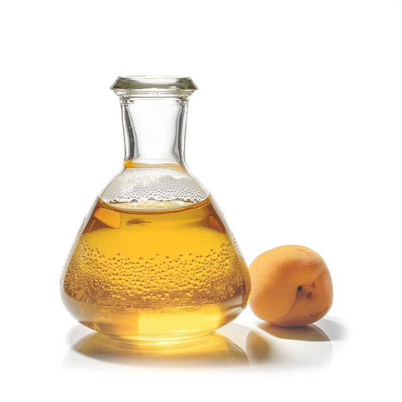 Apricot kernel oil is created by pressing the kernels of the apricot (Prunus armeniaca). It has undergone refining, i.e. a process which removes the aroma and c