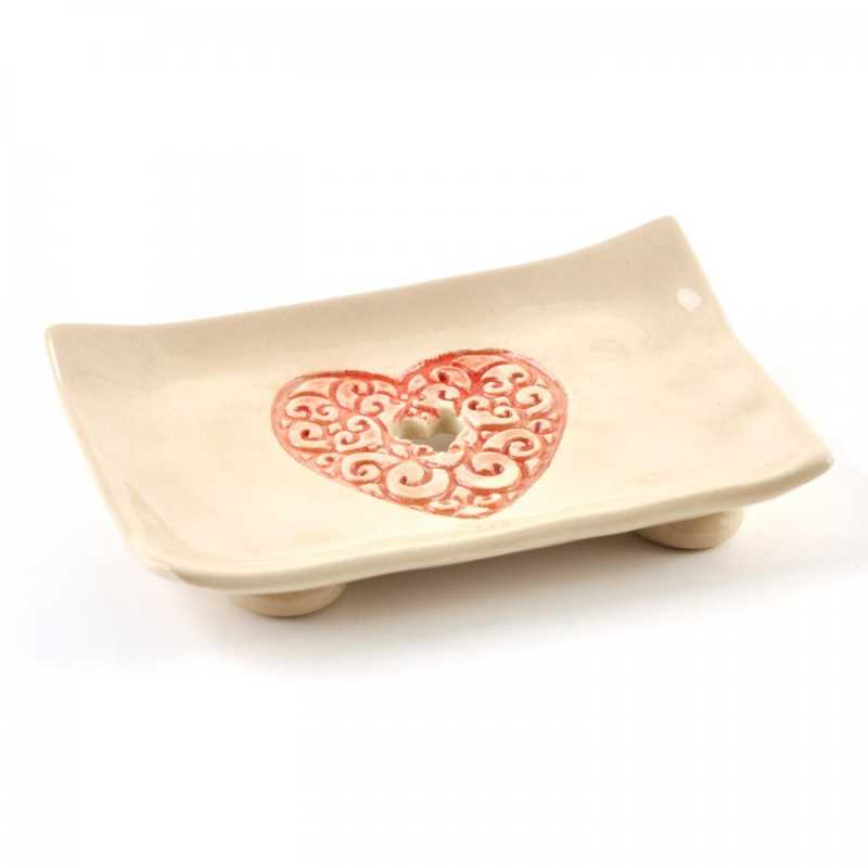 Soap dish on legs, with a heart-shaped hole for water drainage. Decorated with relief.
100% handmade: modelled, embossed, painted, glazed. Ceramic soap dish fr