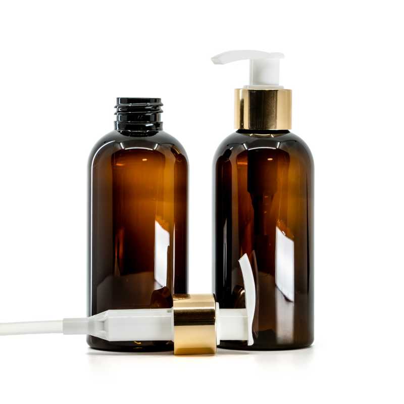 Amber Plastic Bottle, White Lotion Pump With Glossy Gold Collar, 150 ml