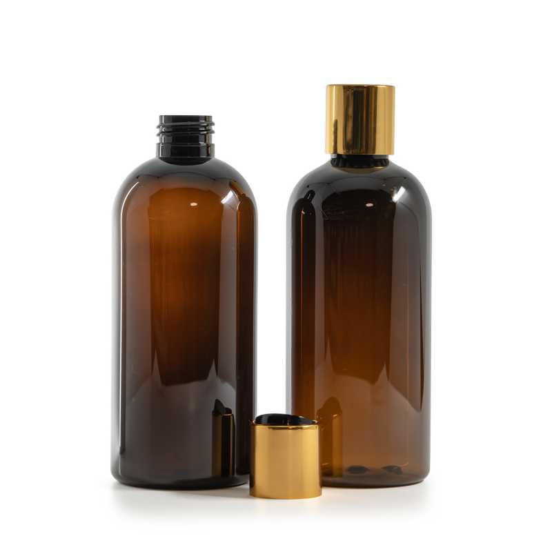 Amber Plastic Bottle, Black Plastic Flip Top With Golden Aluminum Collar, 300 ml