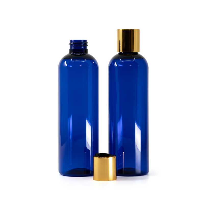 Blue Plastic Bottle, Black Plastic Flip Top With Golden Aluminum Collar, 250 ml