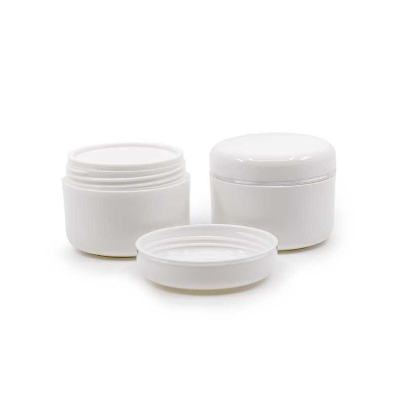 Plastic cup with double bottom and lid in white. The crucible has a rounded interior. Ideal for storing creams, gels, emulsions. The product is designed for sto