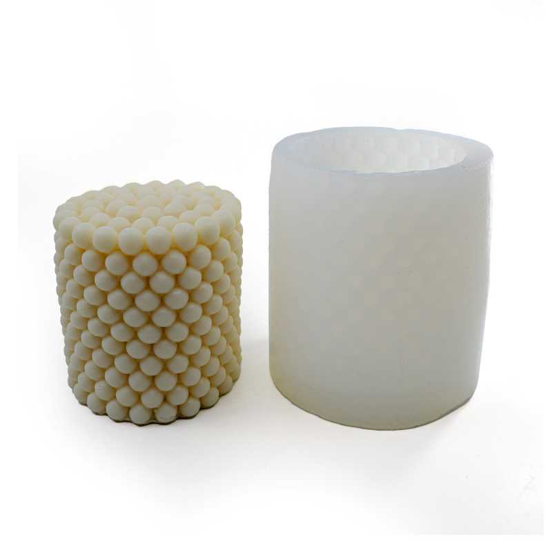 Silicone candle mould in the shape of a cylinder with dots. Pour it with waxes that are designed for freestanding candles.
Silicone moulds are very flexible an