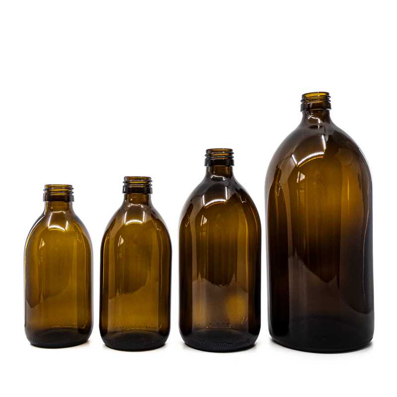 The glass bottle, the so-called vial or syrup bottle, is made of thick glass of dark brown colour. It is used for storing liquids, which, thanks to its colour, 