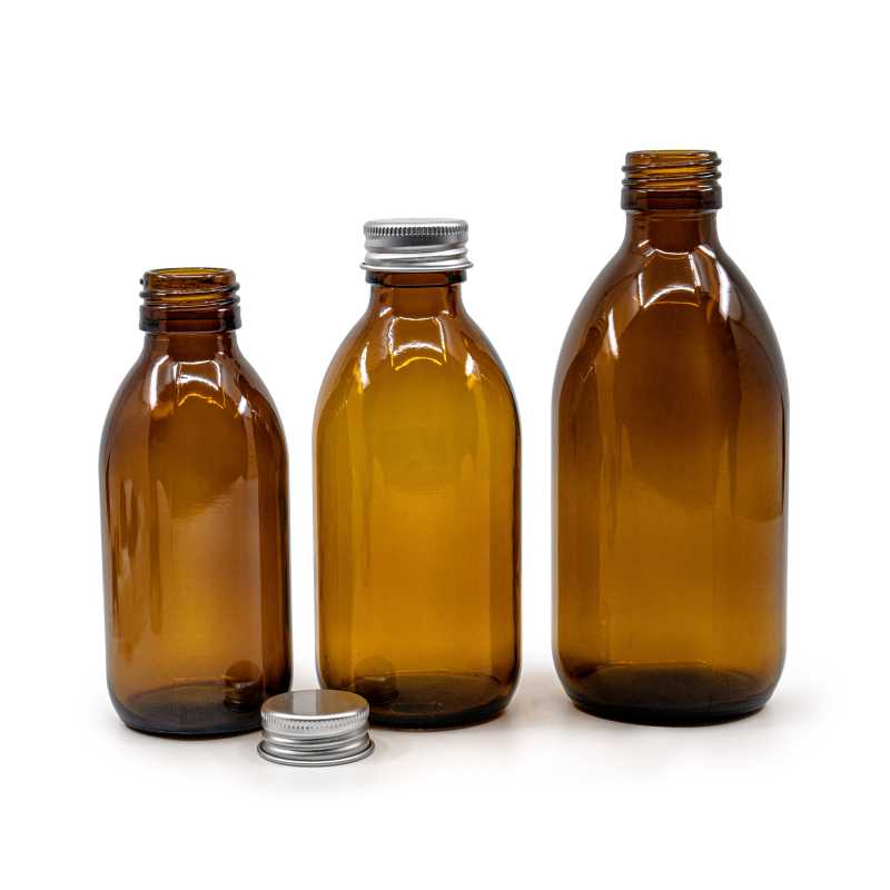 The glass bottle, the so-called BOSTON-type vial, is made of thick, dark brown glass. It is used for storing liquids, which, thanks to its colour, are effective