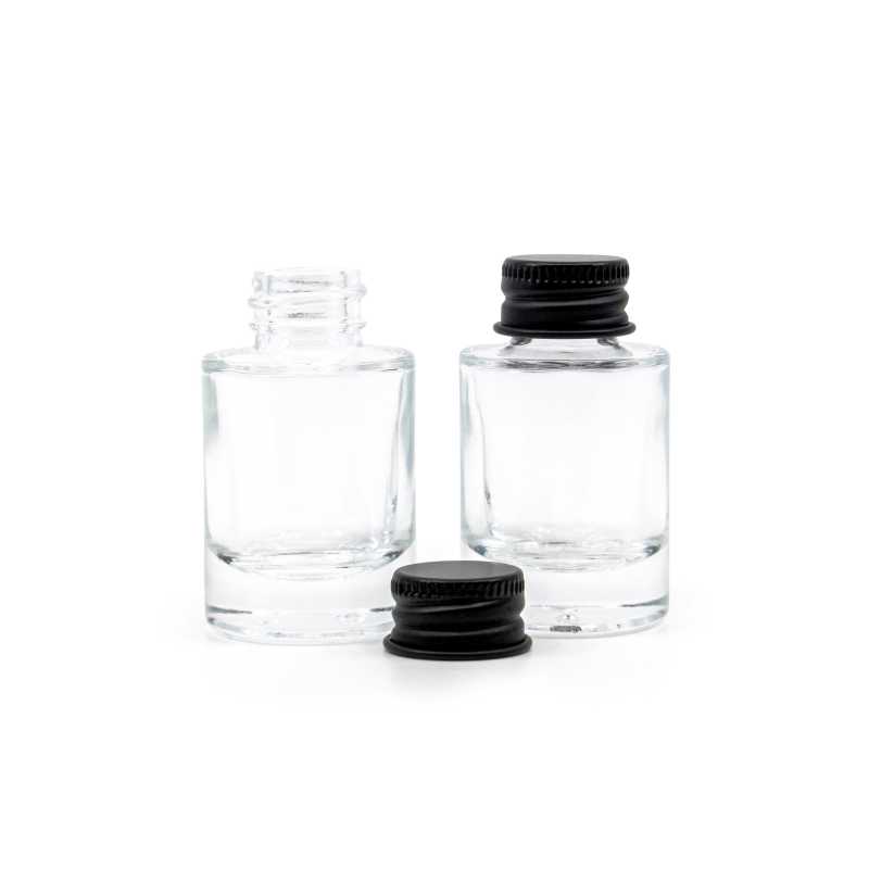 The glass bottle is made of thick transparent glass with a thick bottom. It is used for storing liquids.Volume: 10 ml, total volume 15 mlBottle height: 52,6 mmB