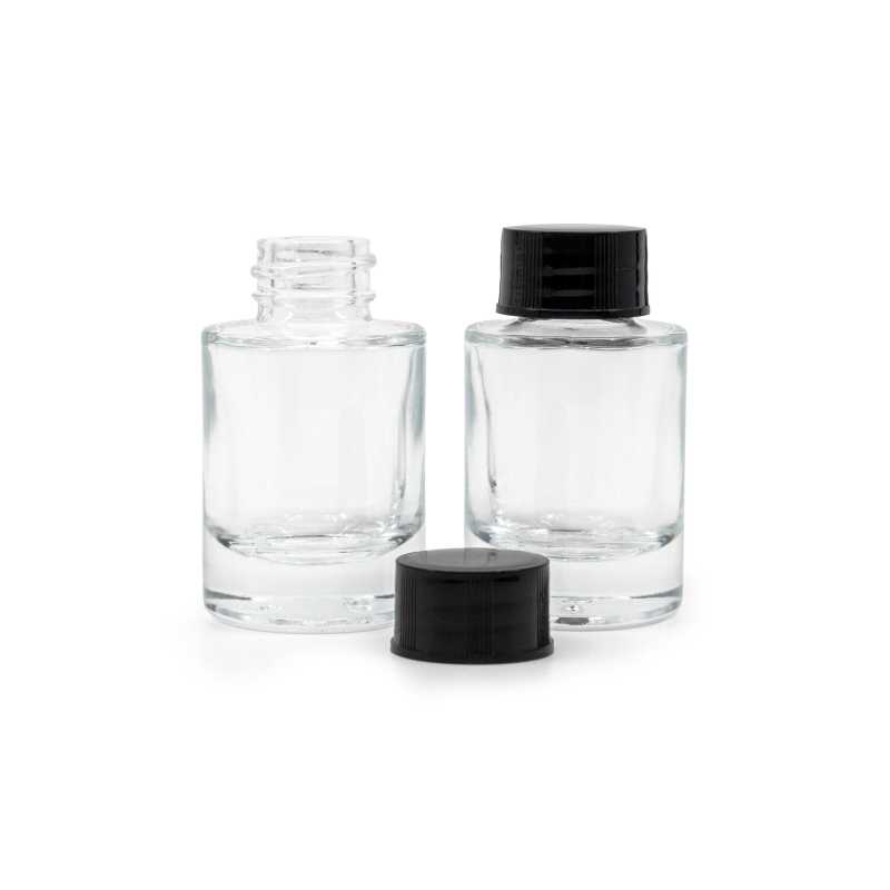 The glass bottle is made of thick transparent glass with a thick bottom. It is used for storing liquids.Volume: 10 ml, total volume 15 mlBottle height: 52,6 mmB