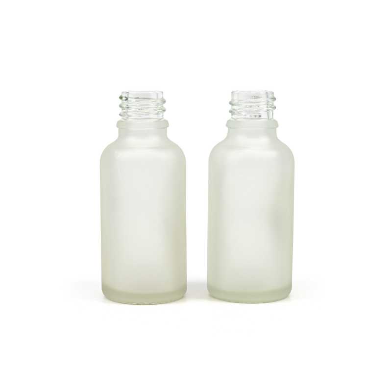 The glass bottle is made of thick transparent glass, which is ground on the outside. It is used for storing liquids.Volume: 30 ml, total volume 35 mlBottle heig