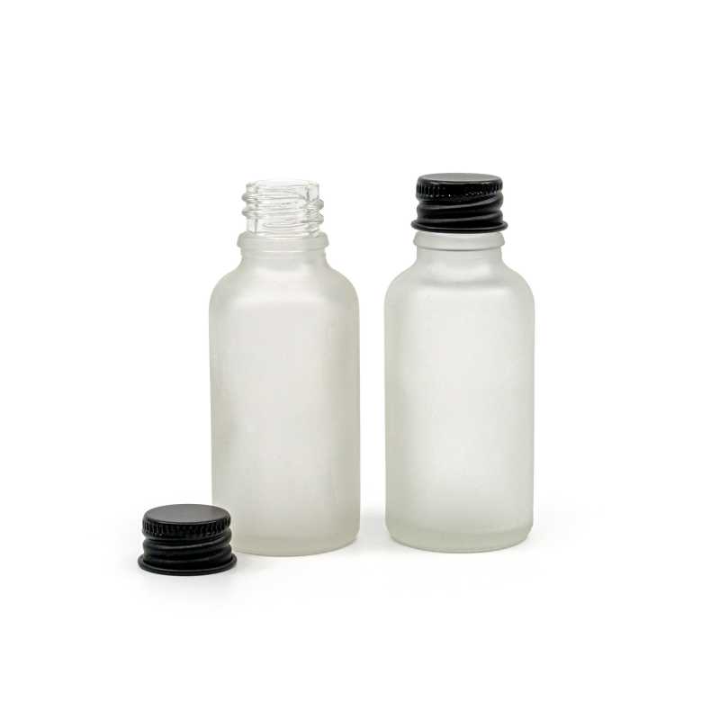 The glass bottle is made of thick transparent glass, which is ground on the outside. It is used for storing liquids.Volume: 30 ml, total volume 35 mlBottle heig