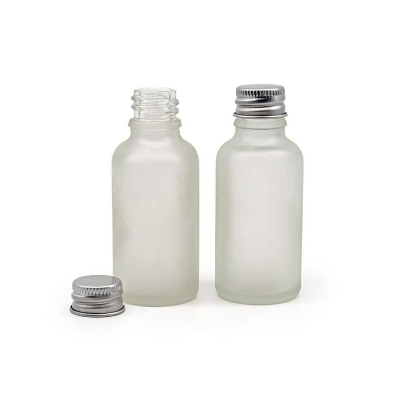 The glass bottle is made of thick transparent glass, which is ground on the outside. It is used for storing liquids.Volume: 30 ml, total volume 35 mlBottle heig