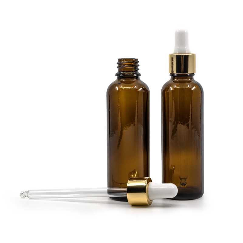Elegant tall glass vial with a volume of 50 ml. 
Theglass bottle, the so-called vial, is made of thick glass of dark brown colour. It is used for storing liqui