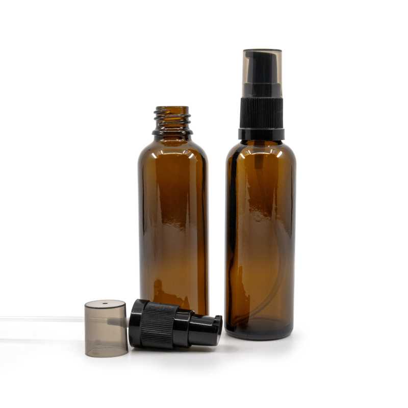 Elegant tall glass vial with a volume of 50 ml. 
Theglass bottle, the so-called vial, is made of thick glass of dark brown colour. It is used for storing liqui
