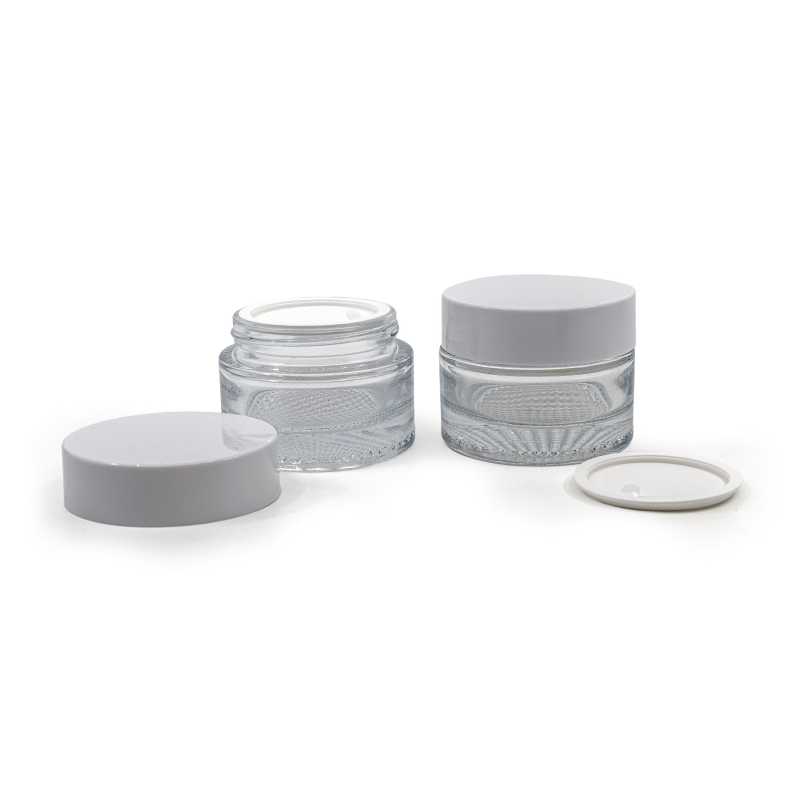 Elegant glass cup made of thick transparent glass with a volume of 50 ml. Suitable for storing creams, balms, oils or samples. The diameter of the lid is 6,4 cm