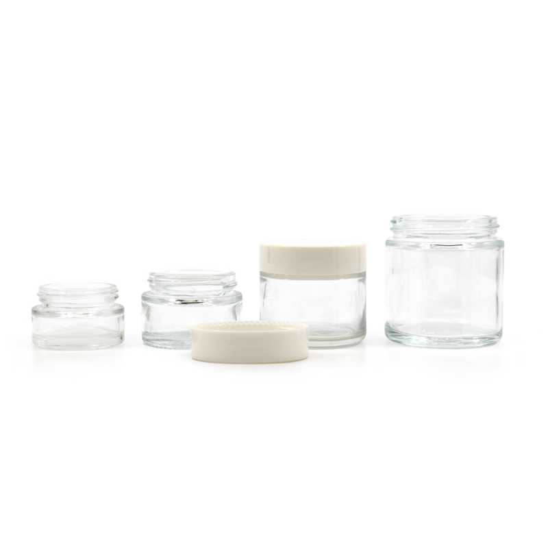 Glass jar made of thick transparent glass, suitable for storing creams, balms, oils or samples. It is also suitable for making candles.It also has an inner lid 