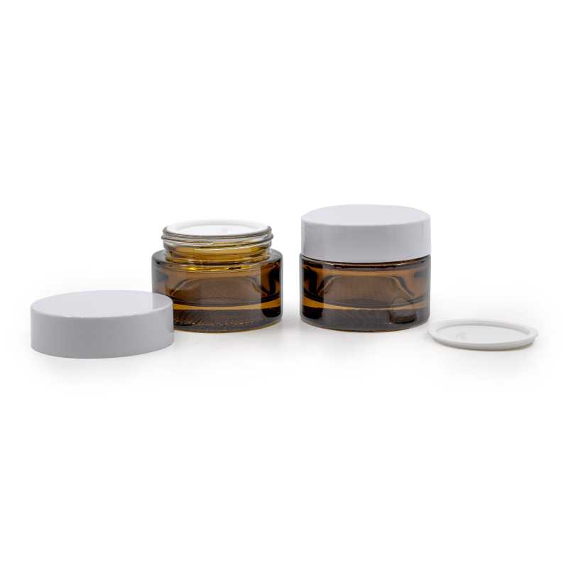 Elegant glass tumbler made of thick brown glass with a volume of 50 ml. Suitable for storing creams, balms, oils or samples. The diameter of the lid is 6,4 cm.H