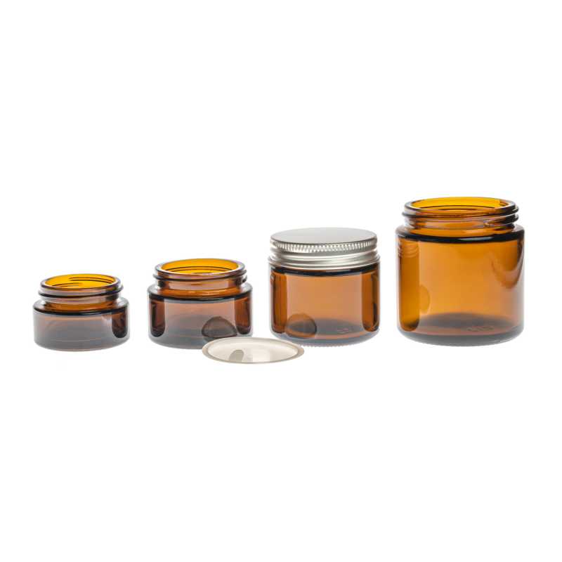 Glass jar made of thick dark brown glass, suitable for storing creams, balms, oils or samples. It also has an inner lid to prevent the cream from spilling out a
