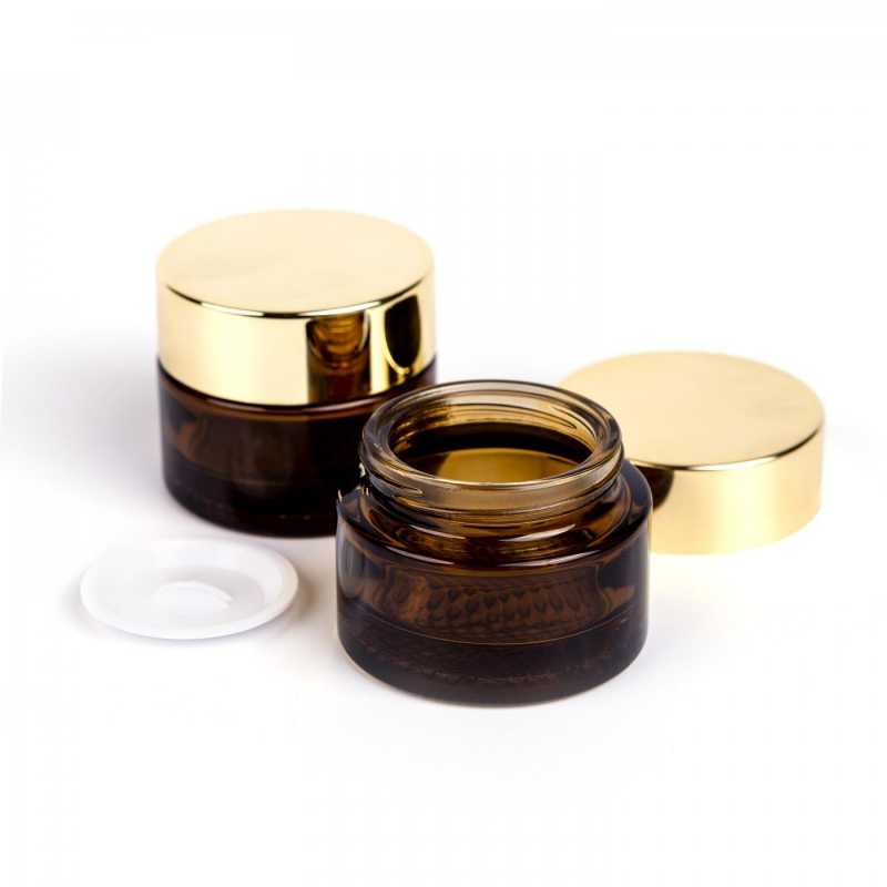 Elegant dark brown thick glass jar, suitable for storing creams, ointments, emulsions or serums. It also has an inner lid to prevent cream from spilling out and