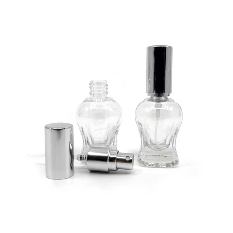 Thedecorative glass atomizer is made of thick transparent glass. The bottle has a silver plastic dispenser with lid. Suitable for perfumes, samples, solutions.
