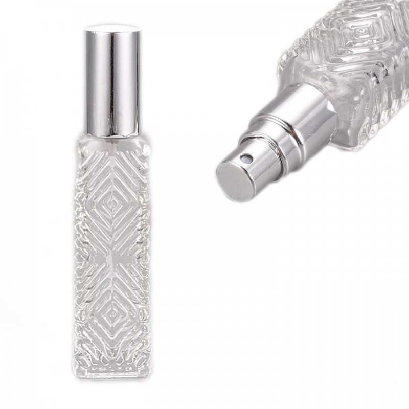 The decorative glass atomizer is made of thick transparent glass. The bottle has a silver plastic dispenser with lid. Suitable for perfumes, samples, solutions.