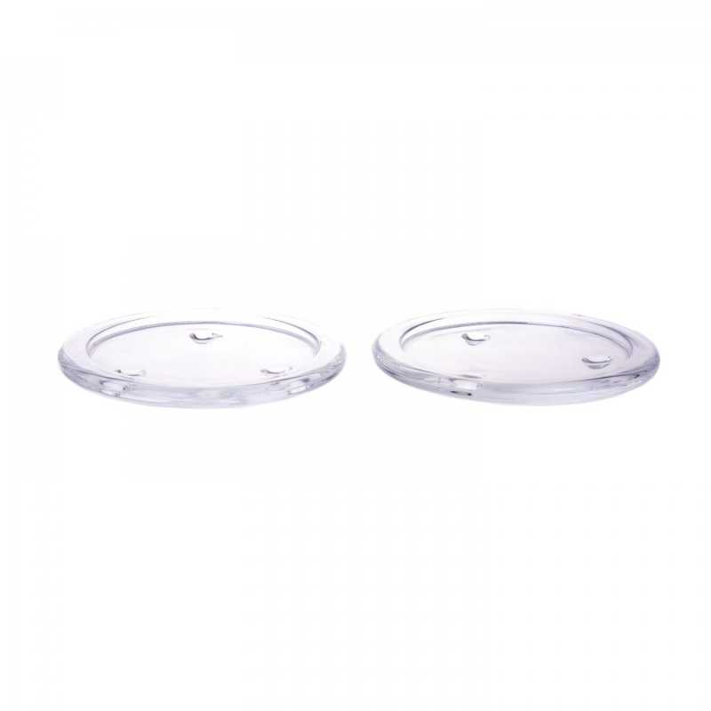 Thick glass saucer suitable as a base for freestanding candles. It protects the object on which the candle is placed and at the same time prevents the wax from 